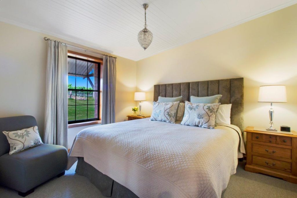 Hideaway Cottage - Bedroom 1 - get a great night sleep in the new king bed and wake up to beautiful vineyard views