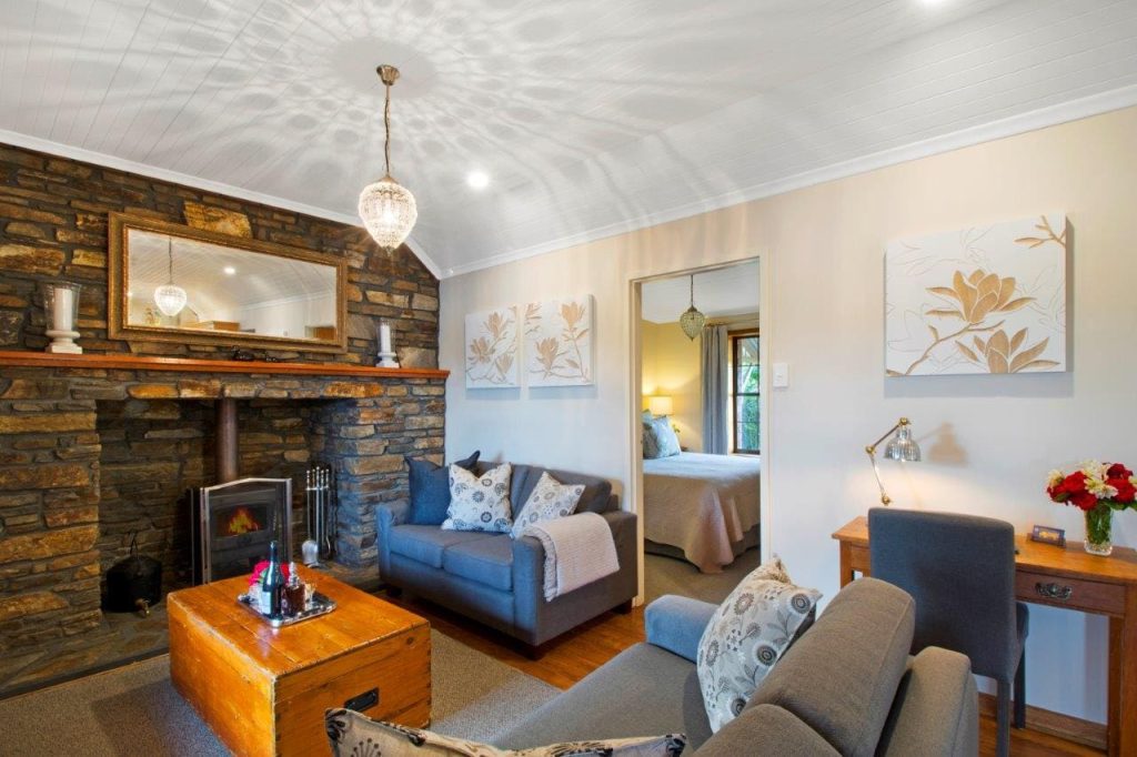 Hideaway Cottage - comfy lounges and cosy wood fire